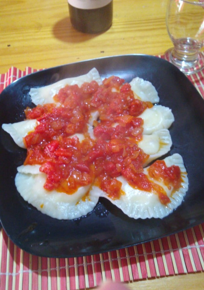 Una foto de Pasta rellena de ricota y nuez