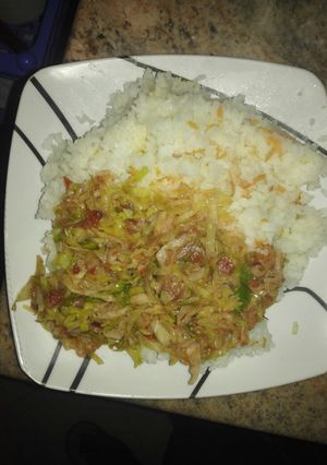 A picture of Simple rice and fried vegetables.