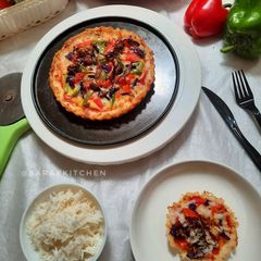 Thin crust rice pizza A picture of Thin crust rice pizza.