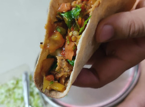 A picture of Desi Mexican taco.