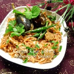 A picture of Aubergine pulao🍆🍚.