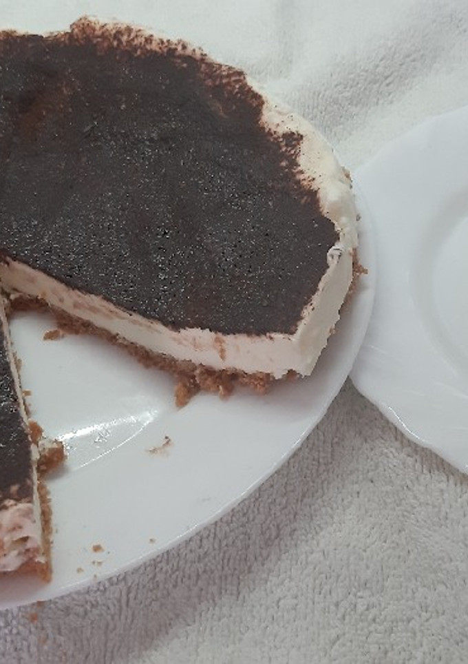 Una foto de Tarta de queso y cacao caramelizado (sin gelatina)