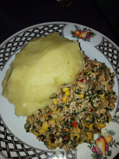A picture of Mashed potatoes and veggies egg sauce.