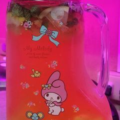 A picture of Lemon, Mango, Strawberry & Mint Leaves.