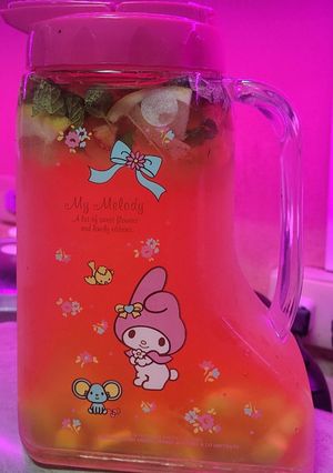 A picture of Lemon, Mango, Strawberry & Mint Leaves.