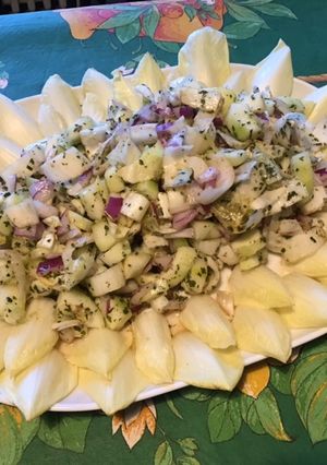 A picture of Endive Salad with Cucumber and Red Onion in Chive Dressing.
