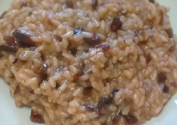 Passi a Preparare Premiato Risotto funghi e rapa rossa
