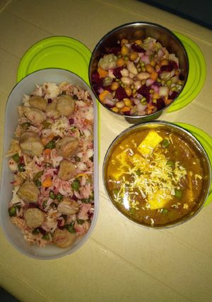 A picture of Soya nuggets rice with matar paneer and sprouts salad.