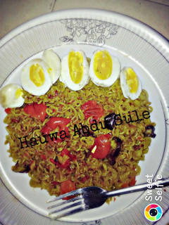 A picture of Indomie with boiled egg.