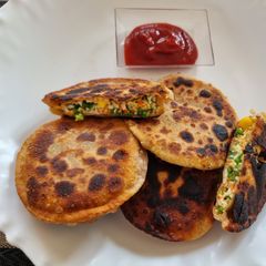 A picture of Paneer and vegetable pockets.