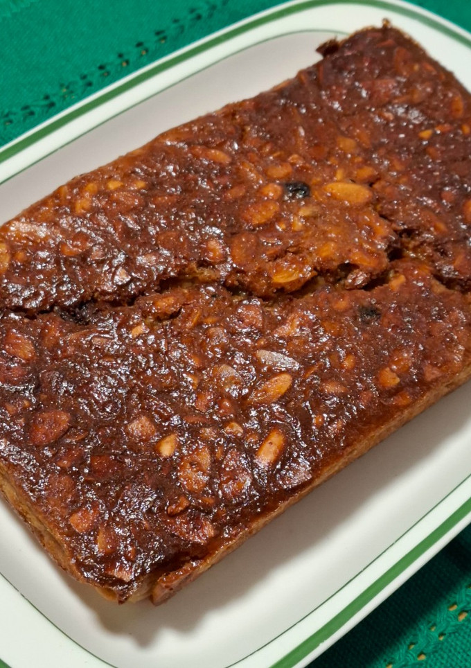 Una foto de Budín de pan con almendras y arándanos