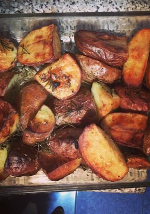 Una foto de Papas al romero