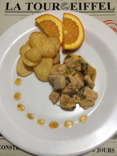 Una foto de Pollo a la naranja y vino blanco
