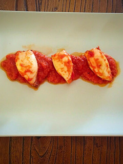 Una foto de Chipirones con tomate