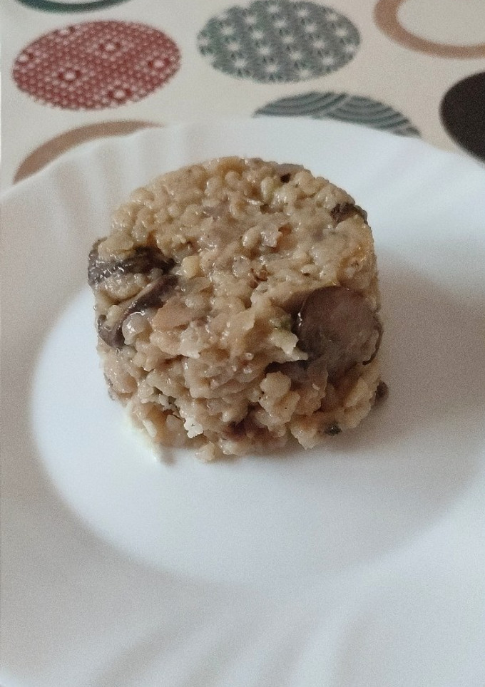 Una foto de Risotto con variedad (setas, champiñones y alguna que otra nuez)