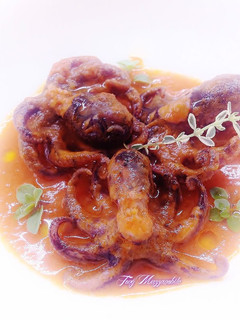Foto di Moscardini in salsa piccante