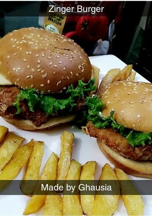 A picture of Crispy chicken cheesy zinger burgers 😋.