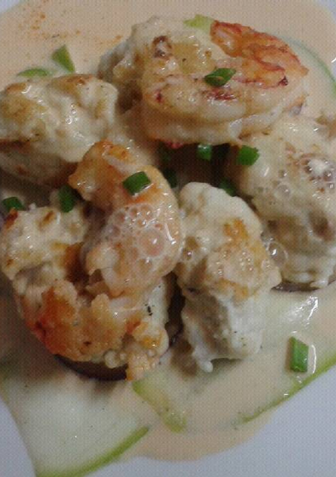 Una foto de Malfatti de tubo de calamar (con salsa de langostinos)