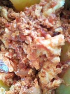 A picture of Sweet potatoes and egg sauce.