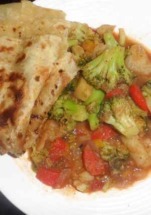 A picture of Brocolli served with chapati.
