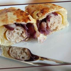 A picture of Fluffy's sausage rolls with caramelised red onion.