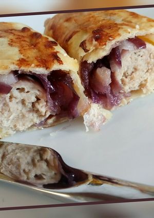 A picture of Fluffy's sausage rolls with caramelised red onion.