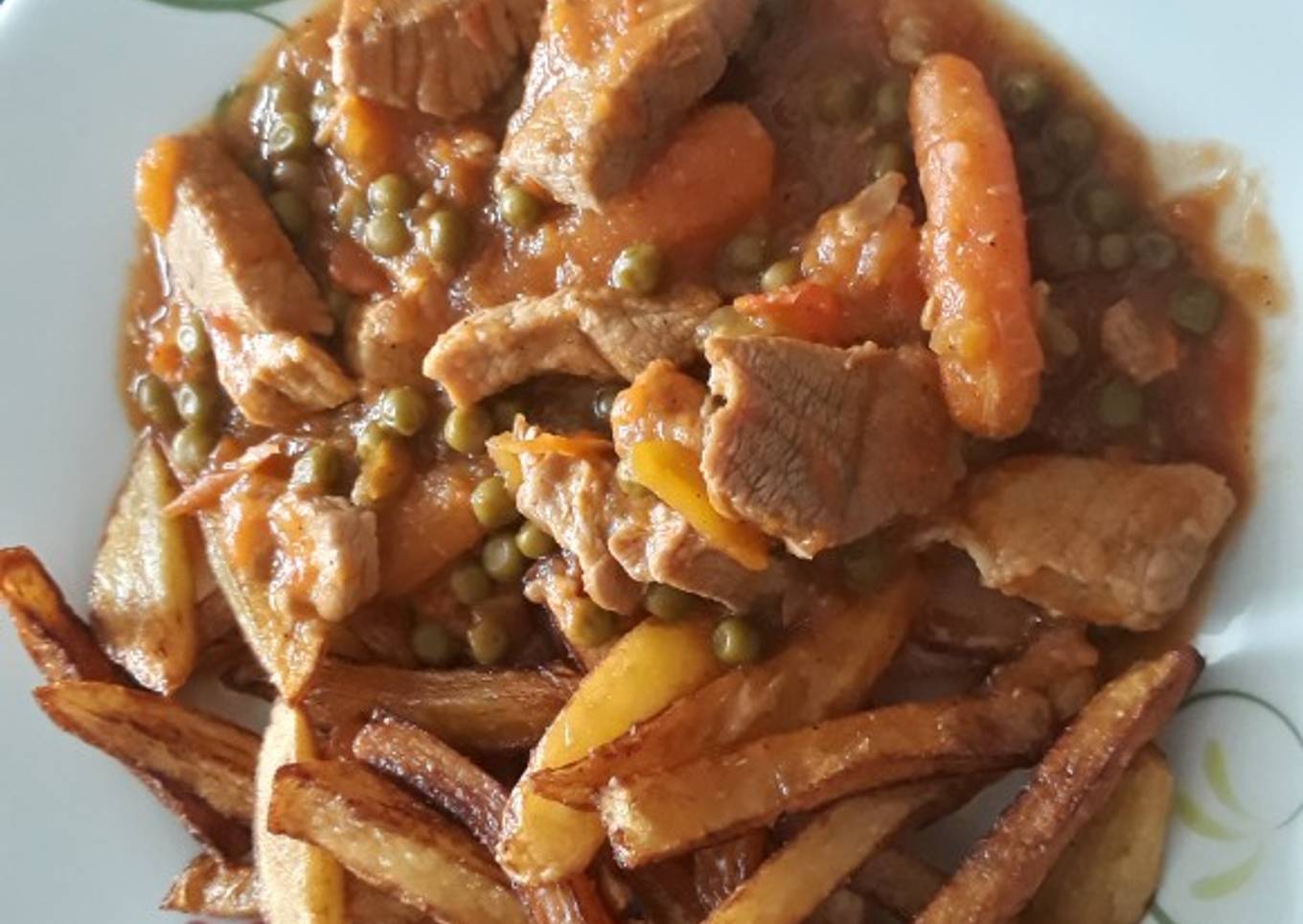 Carne de lomo de cerdo en salsa