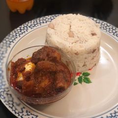 A picture of Rice, beans and stew.