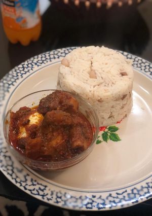 A picture of Rice, beans and stew.