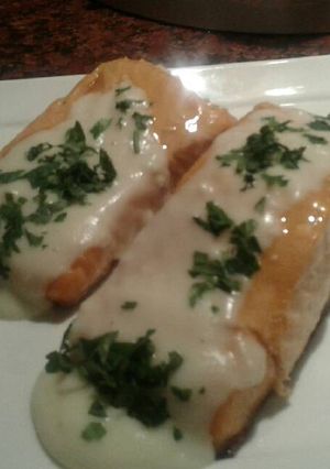 Una foto de Salmón y bechamel de limón