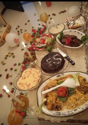 A picture of Biryani, Chapli kabab,fruit custard and cake.