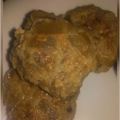 A picture of Burger Patties with Caramelized Onion.