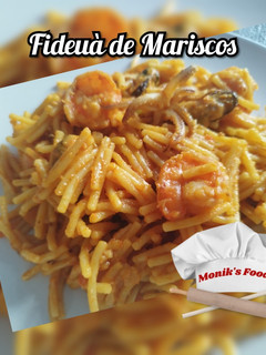 Una foto de Fideuà de Mariscos 🦀