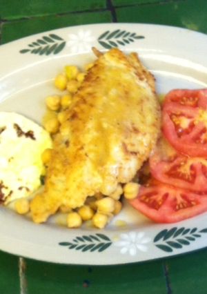 Una foto de Pescado con garbanzos