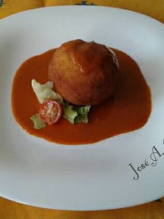 Una foto de Bombas de patata y bacalao