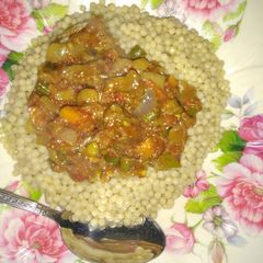 A picture of Plomb with vegetable sauce.