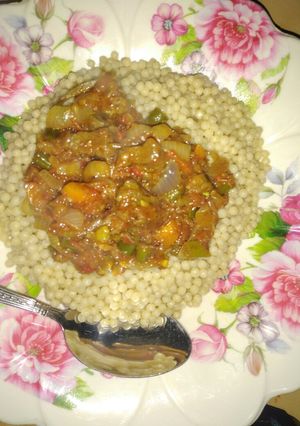 A picture of Plomb with vegetable sauce.