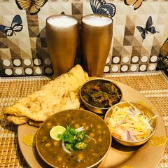Bhature with chanay and lassi A picture of Bhature with chanay and lassi.