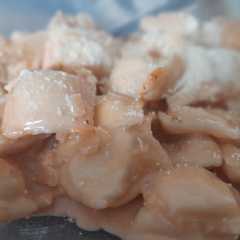 Una foto de Ravioles con salsa rosa