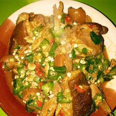 A picture of Okro soup with goat meat.