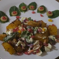 Baked potato salad with pomegranate A picture of Baked potato salad with pomegranate.