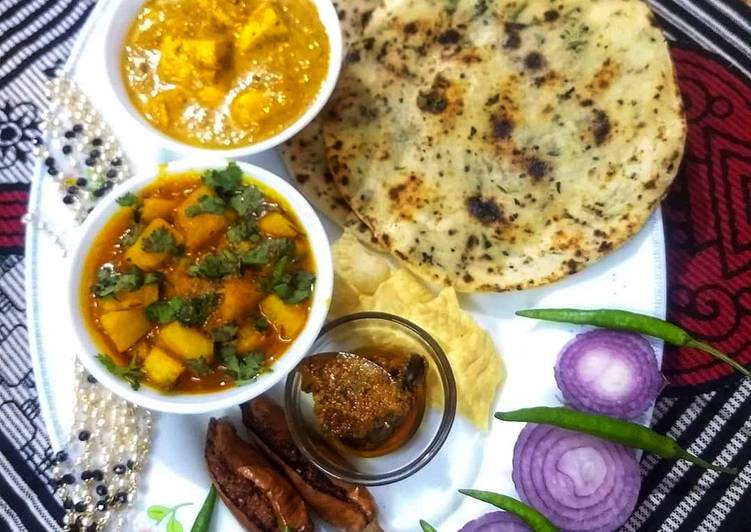 Butter paneer with naan and aloo gravy