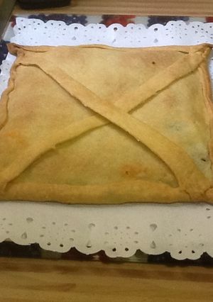 Foto principal de Empanada de morcilla, manzana y cebolla caramelizada