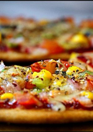 A picture of MINI PIZZA ON TAWA | No OVEN | VEGETABLE MINI PIZZA FOR KIDS |QUICK & EASY PIZZA RECIPE.