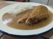 Una foto de pechuga de pollo estofado