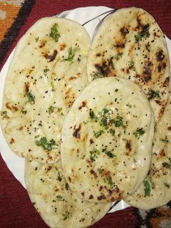 তন্দুরি বাটার নান (tandoori butter naan recipe in Bengali) রেসিপির প্রধান ছবি