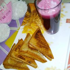 A picture of Grilled Veggies Curd Toast.