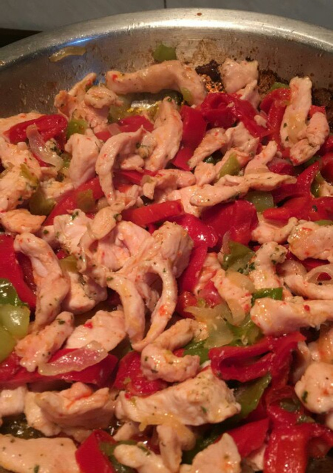 Una foto de Relleno para fajitas de pollo, pimiento y cebolla