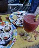 Ostiones a la parmesana en concha