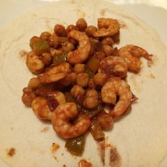 A picture of Spicy prawn, chickpea and pepper wrap.